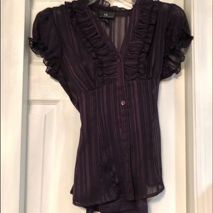 A short sleeve purple blouse